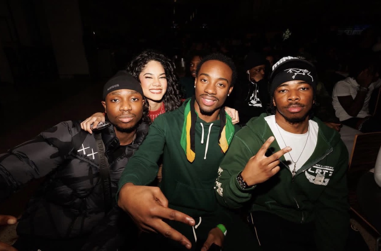 DJ Facey with guests in the crowd